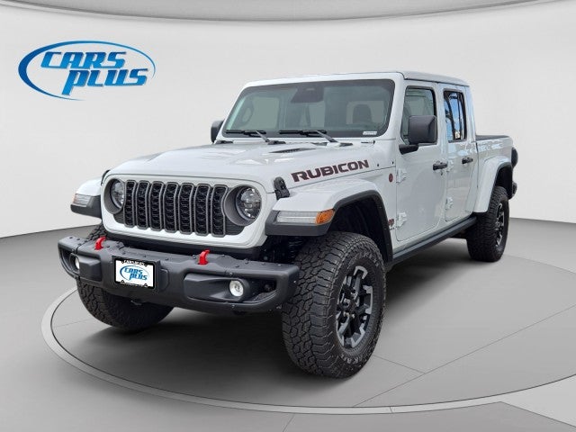 2026 Jeep Gladiator Rubicon in Bright White Clear-Coat Exterior Paint — front three-quarter view