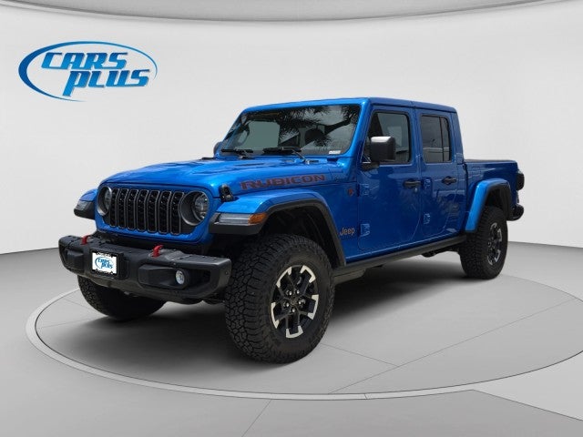 2026 Jeep Gladiator Rubicon in Hydro Blue Pearl-Coat Exterior Paint — front three-quarter view