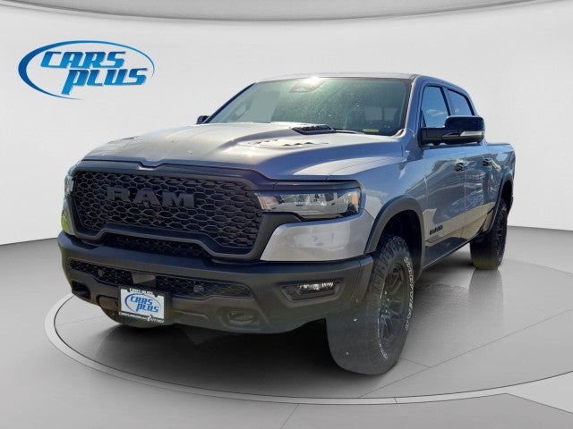 2025 RAM Ram 1500 Rebel in Billet Silver Metallic Clear-Coat Exterior Paint — front three-quarter view